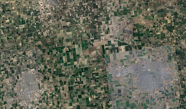 A satellite image showing a disputed territory with visible military presence and signs of conflict.