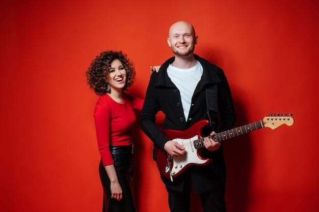 A wide shot of a band posing for a promotional photo. They are standing close together and smiling confidently at the camera.